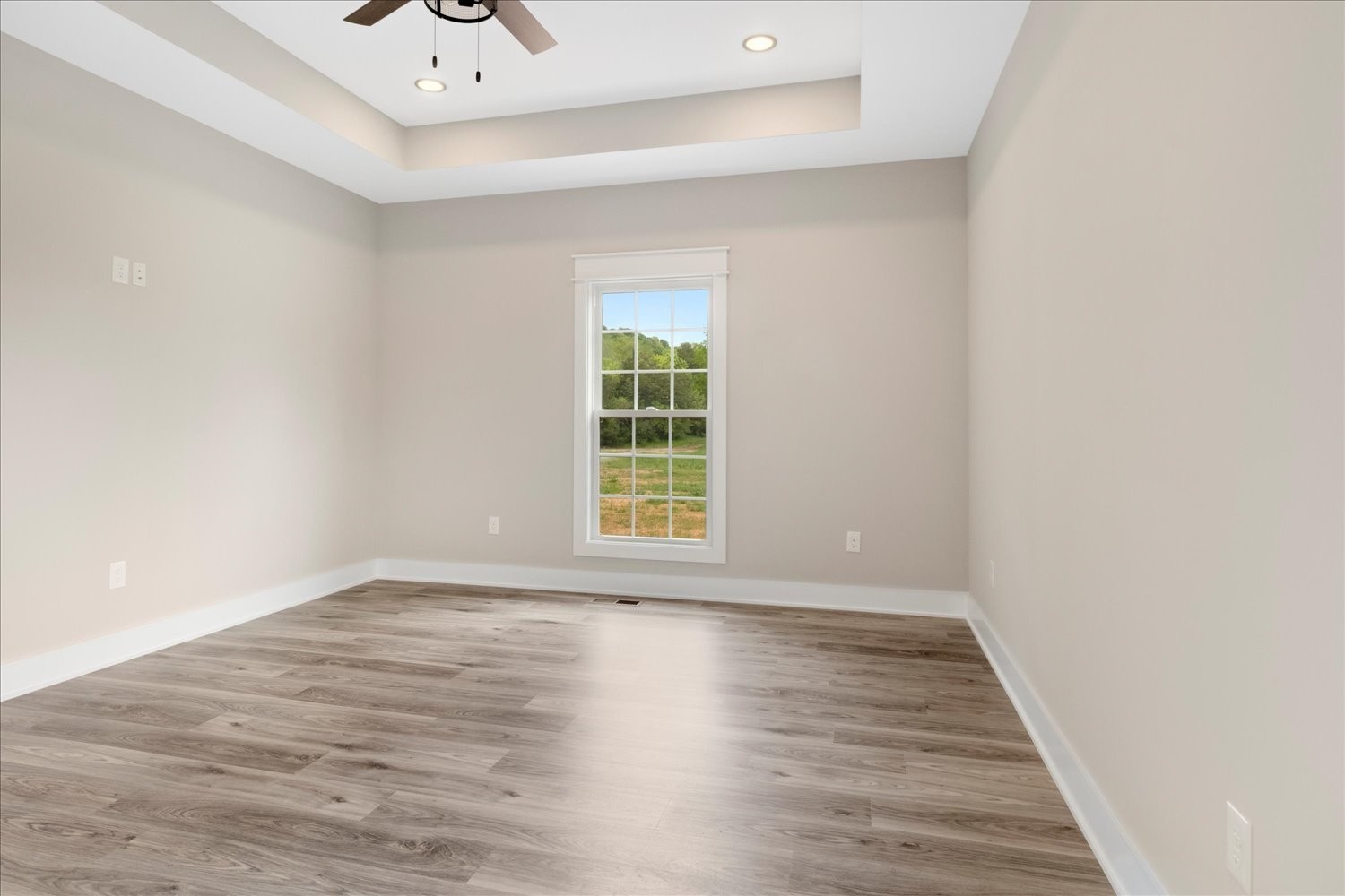 3180 Jett Road Pulaski, TN 38478 - Photo 14 of 27 a view of an empty room with wooden floor and a window