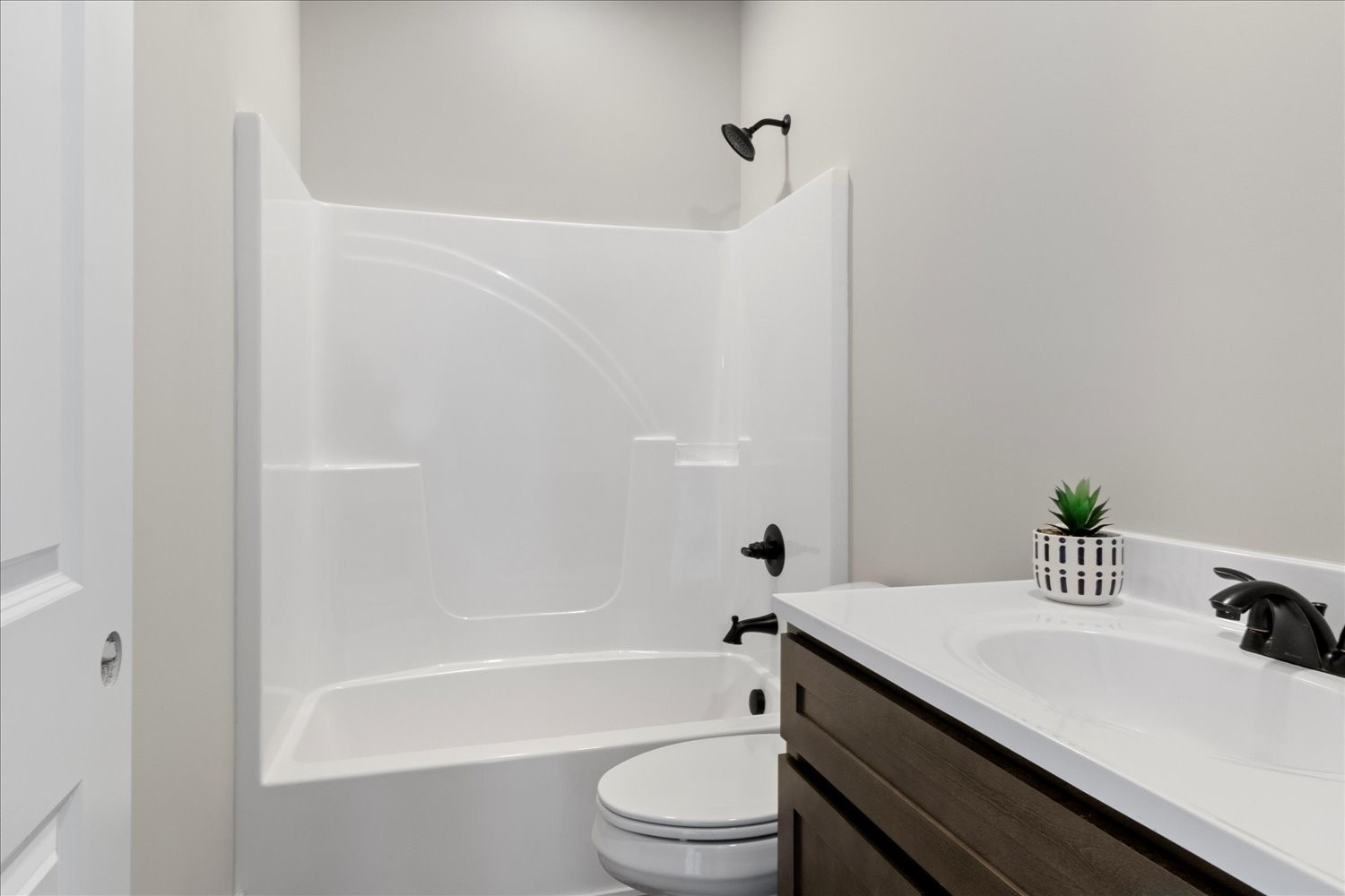 3180 Jett Road Pulaski, TN 38478 - Photo 8 of 27 a bathroom with a sink a toilet and a bathtub