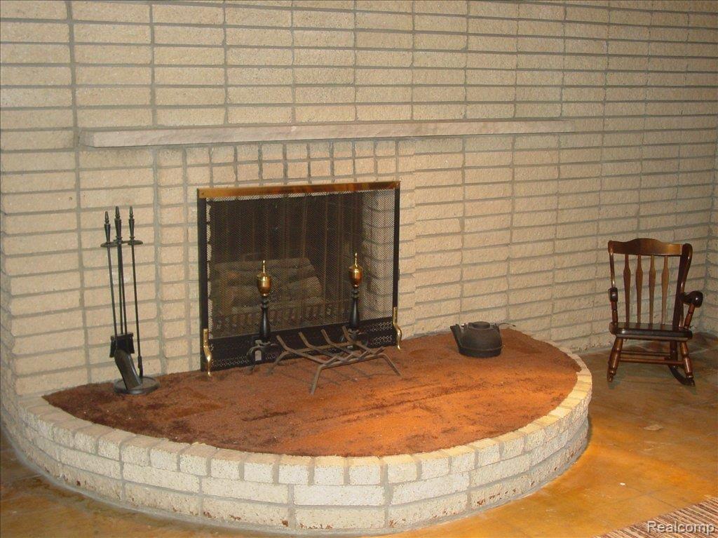 48028 Fuller Road New Baltimore, MI 48051 - Photo 9 of 12 Fireplace 2