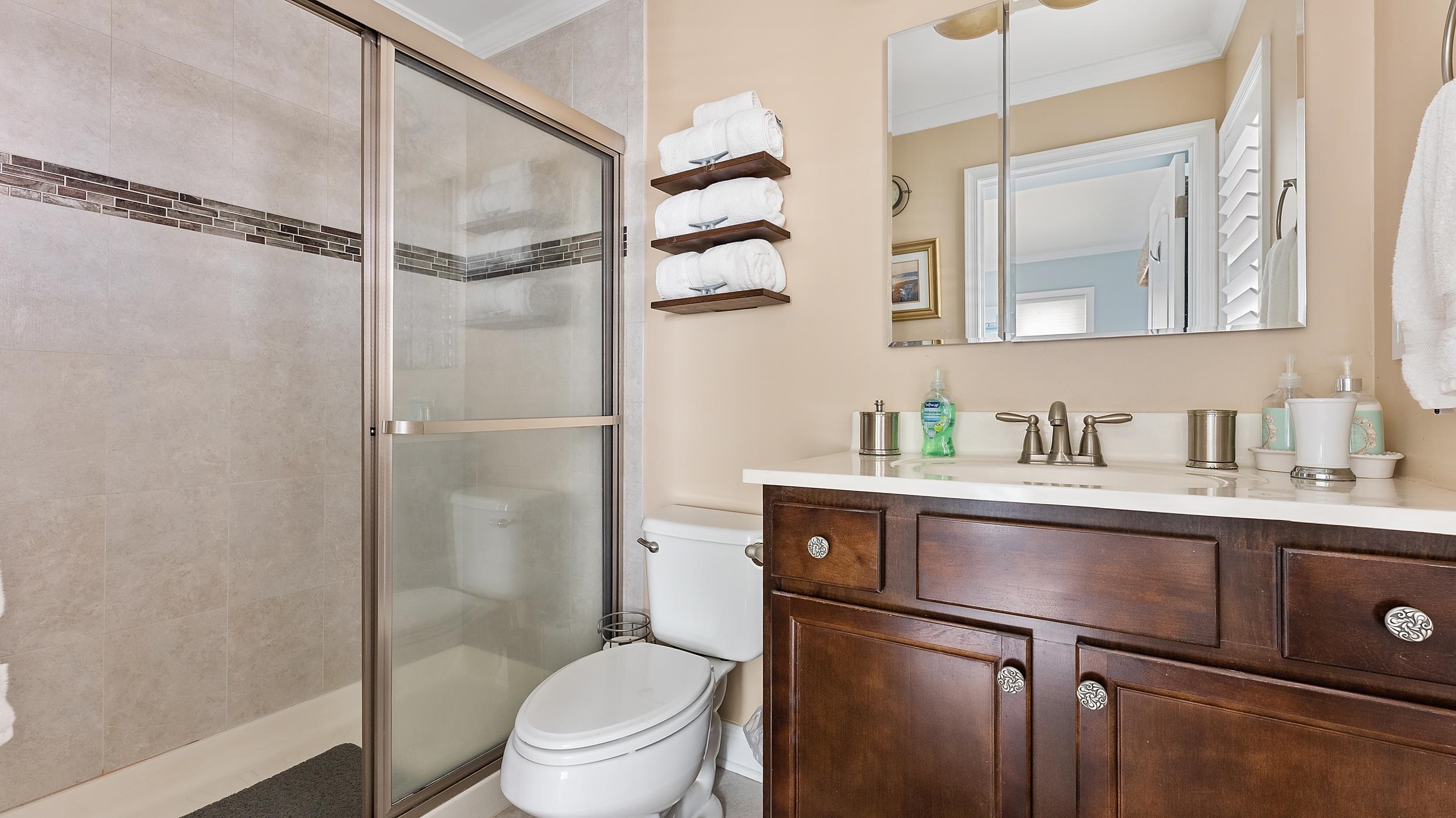 4477 Venicean Road, Unit SOUTH Sea Isle City, NJ 08243 - Photo 15 of 36 a bathroom with a sink toilet and shower