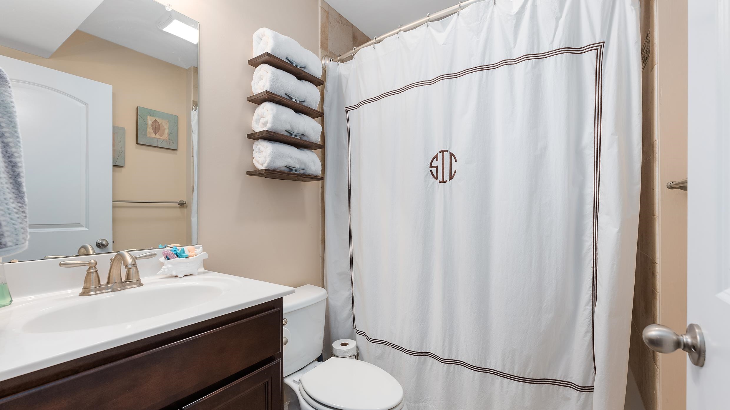 4477 Venicean Road, Unit SOUTH Sea Isle City, NJ 08243 - Photo 20 of 36 a bathroom with a sink toilet and shower