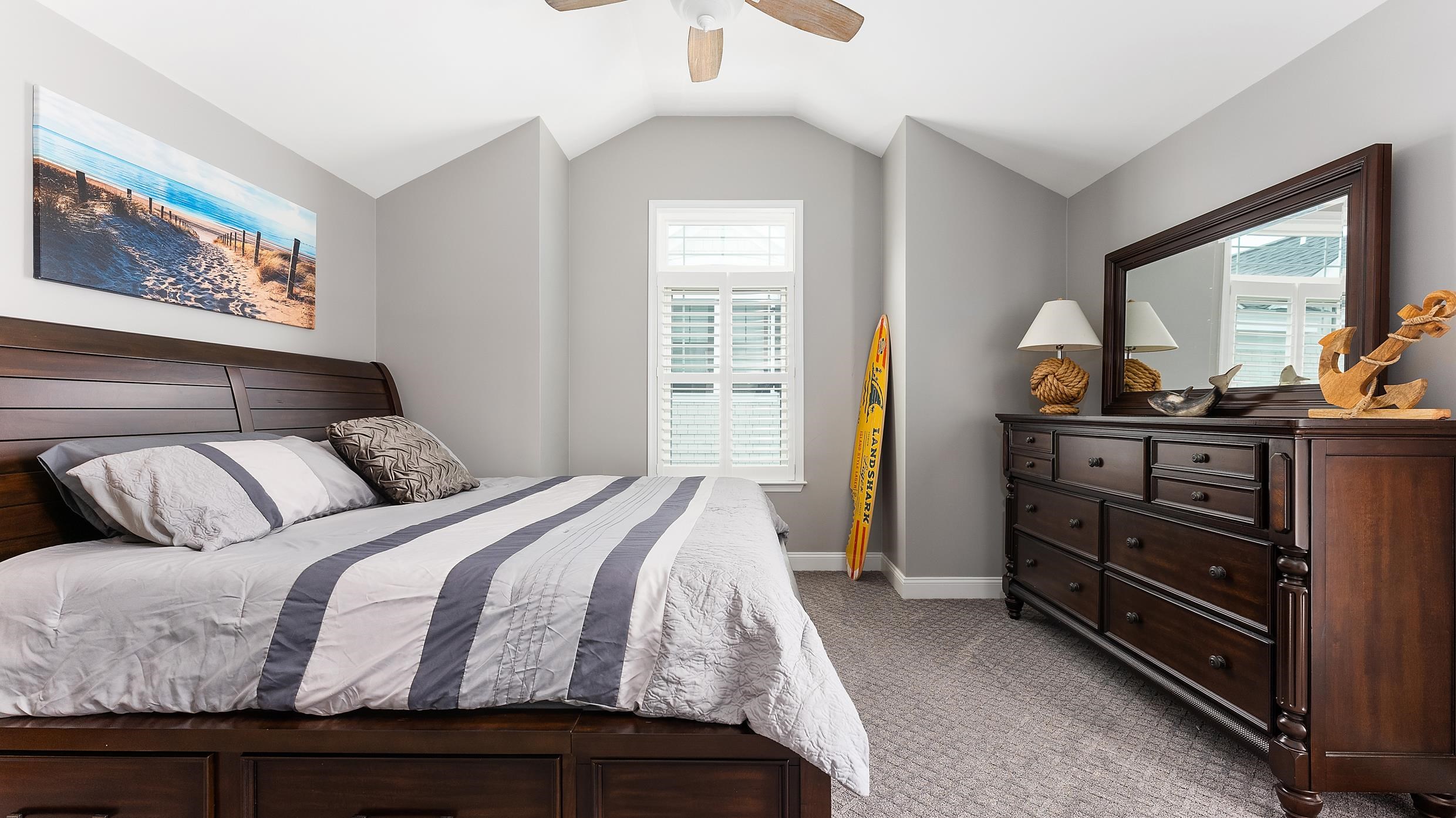 4477 Venicean Road, Unit SOUTH Sea Isle City, NJ 08243 - Photo 22 of 36 a bedroom with a bed and a dresser