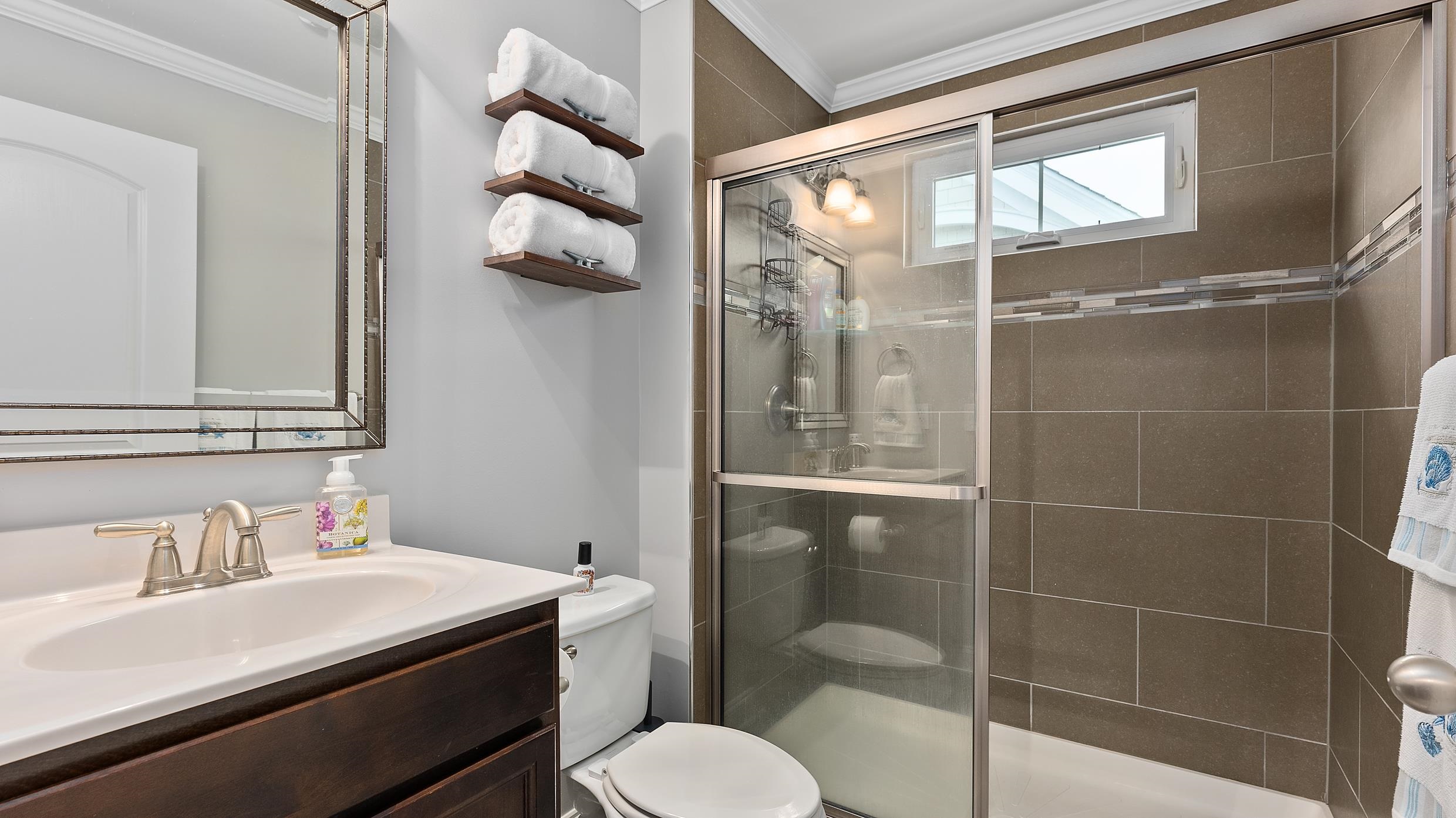 4477 Venicean Road, Unit SOUTH Sea Isle City, NJ 08243 - Photo 23 of 36 a bathroom with a sink toilet and shower