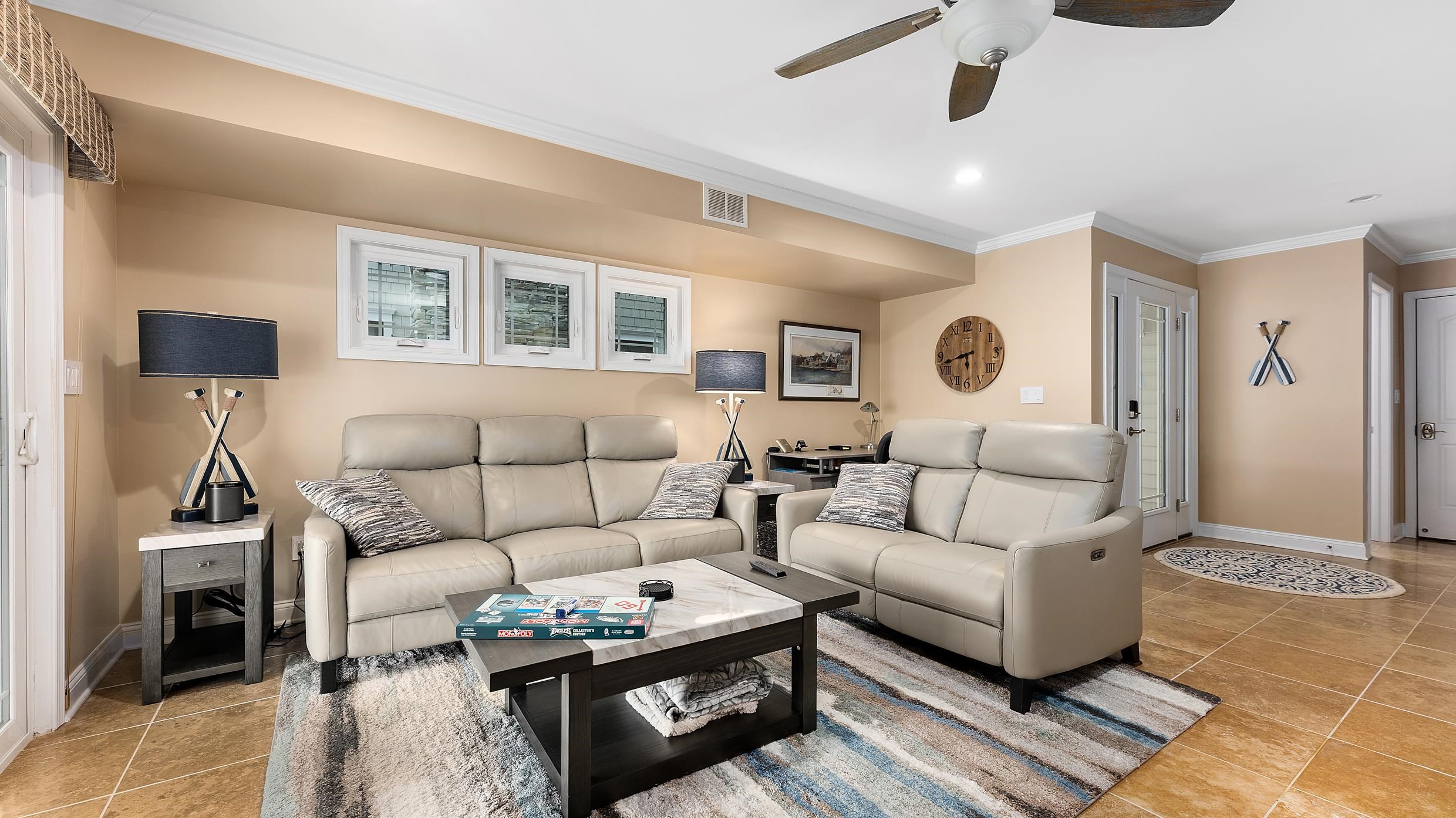 4477 Venicean Road, Unit SOUTH Sea Isle City, NJ 08243 - Photo 27 of 36 a living room with furniture and a lamp