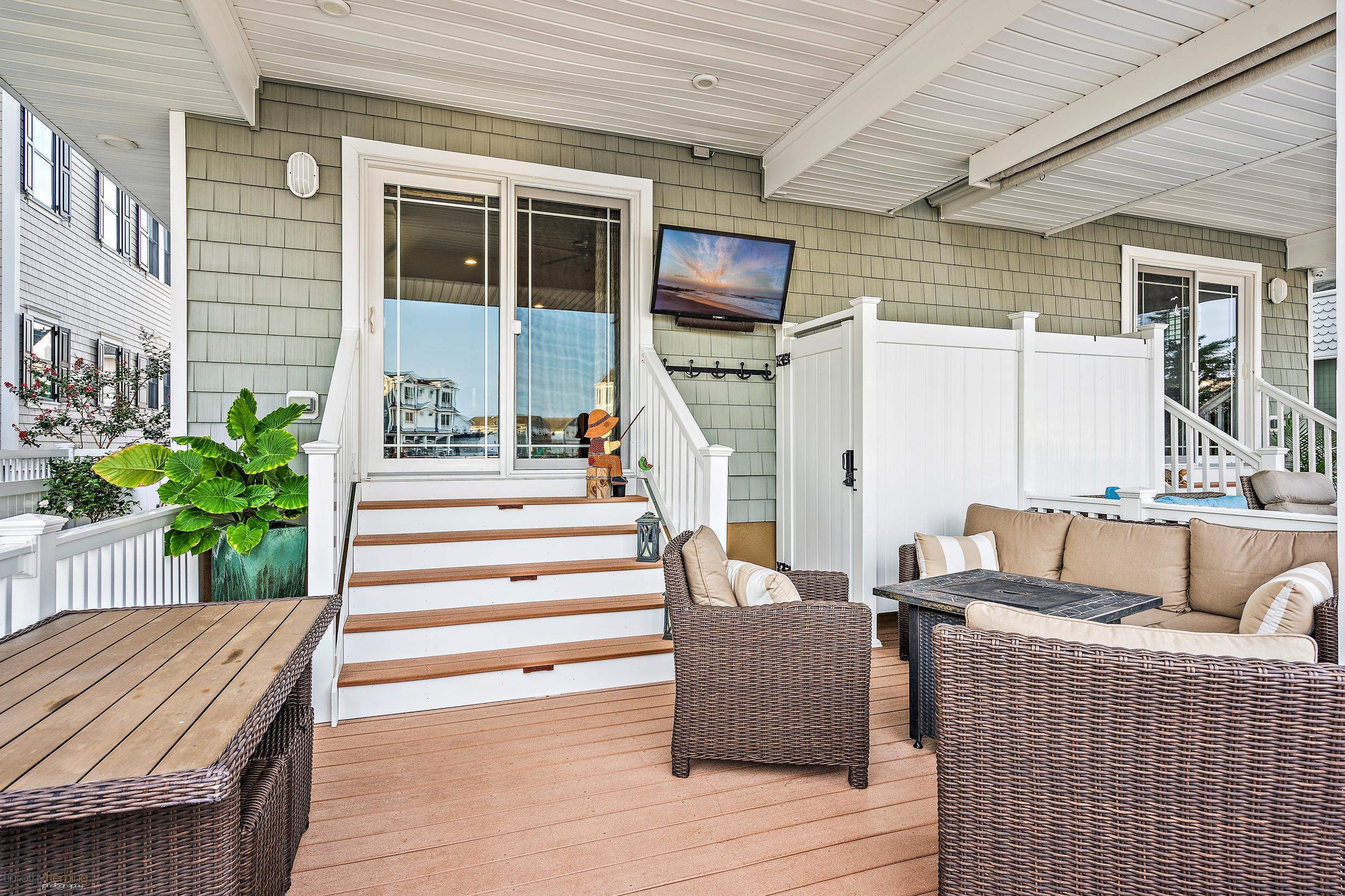 4477 Venicean Road, Unit SOUTH Sea Isle City, NJ 08243 - Photo 34 of 36 a outdoor space with patio furniture