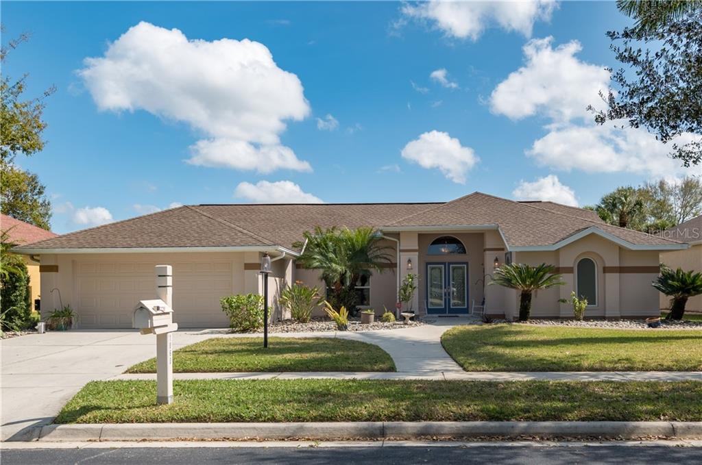 This beautiful home is in exclusive Harbour Oaks, a deed-restricted, gated community with public water and sewer.