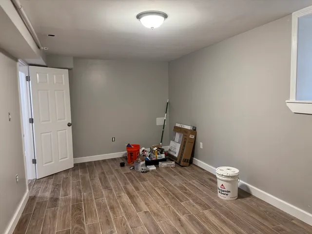 a very nice looking room with wooden floor