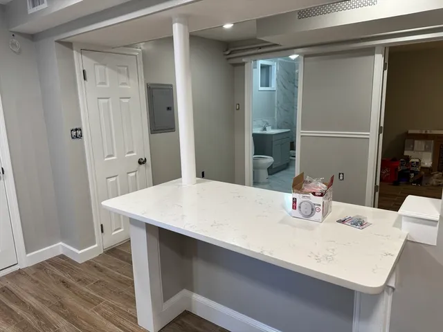 a room with a table and chairs