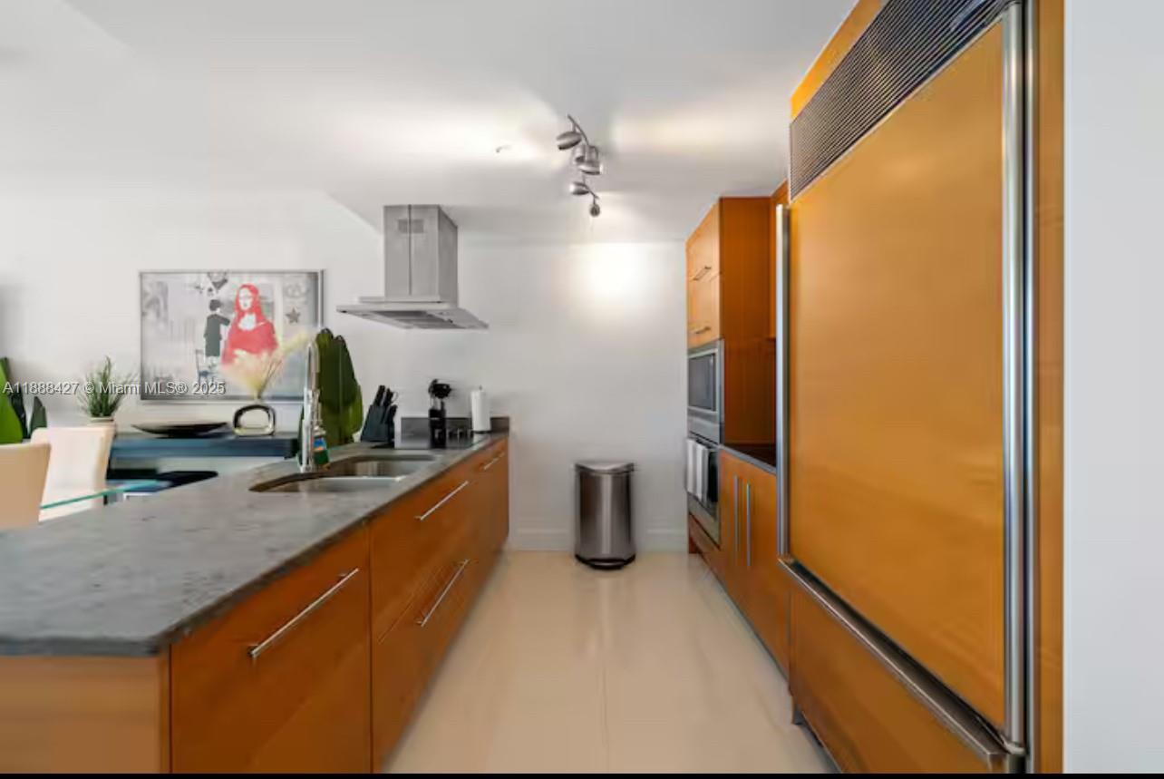485 Brickell Avenue, Unit 3707 Miami, FL 33131 - Photo 20 of 41 a kitchen with stainless steel appliances granite countertop a refrigerator and a sink
