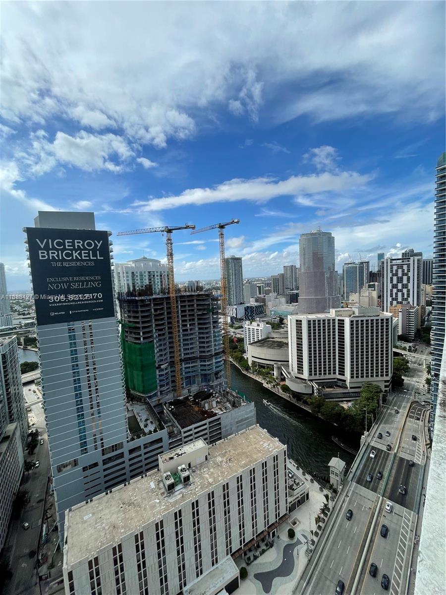485 Brickell Avenue, Unit 3707 Miami, FL 33131 - Photo 31 of 41 a view of a balcony with chairs