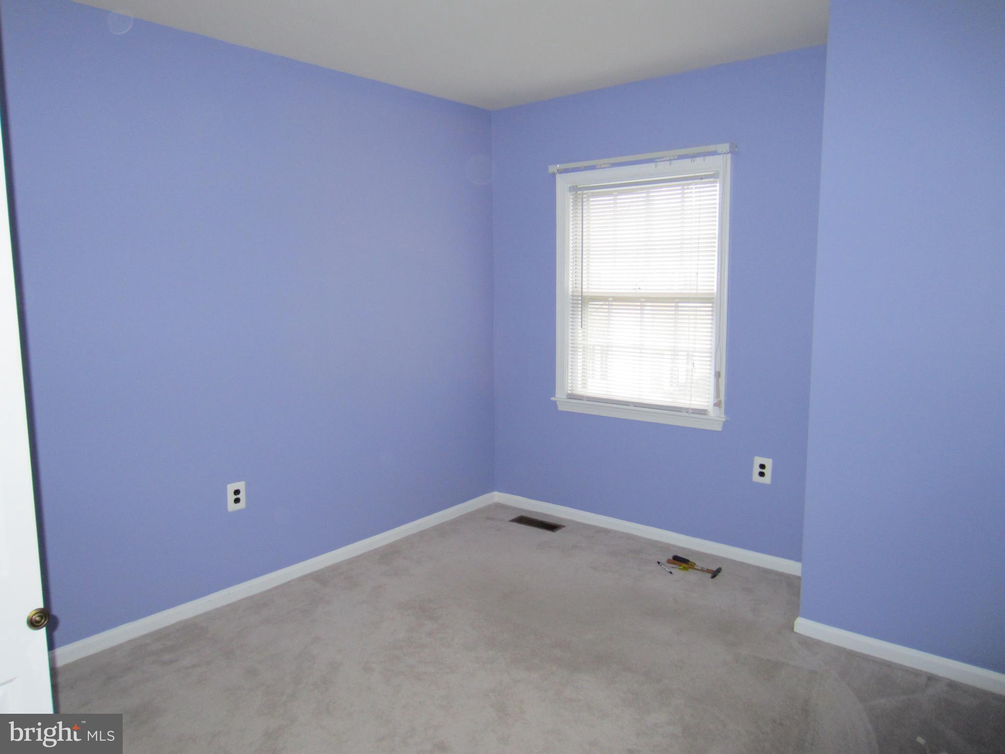 6486 Franconia Road Springfield, VA 22150 - Photo 9 of 16 a view of an empty room with a window
