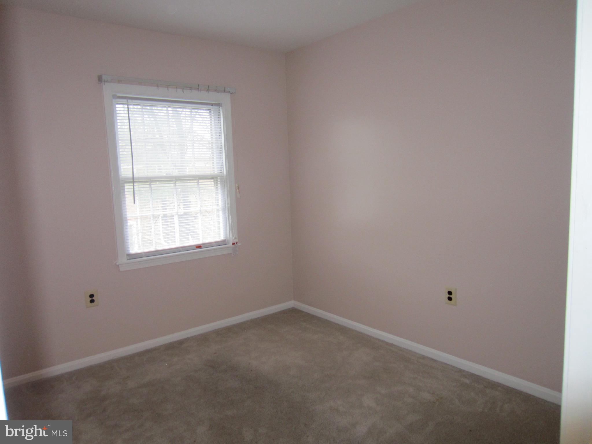 6486 Franconia Road Springfield, VA 22150 - Photo 10 of 16 an empty room with a window