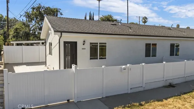 a view of a house with a park