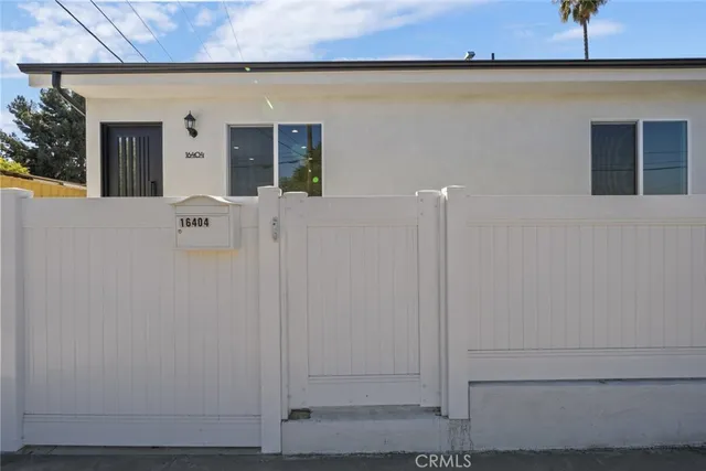a view of a backyard with mountain view and a garden