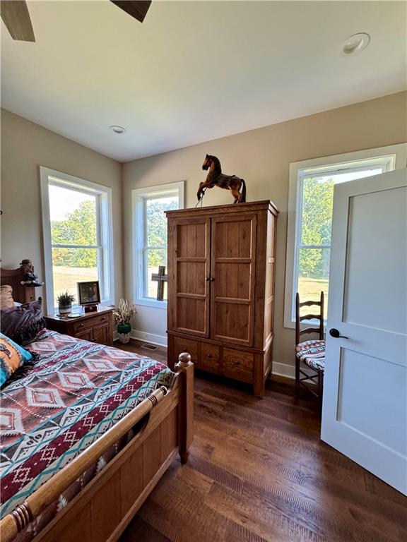 250 Hook Road Northeast Ranger, GA 30734 - Photo 30 of 114 a bedroom with a bed and a window