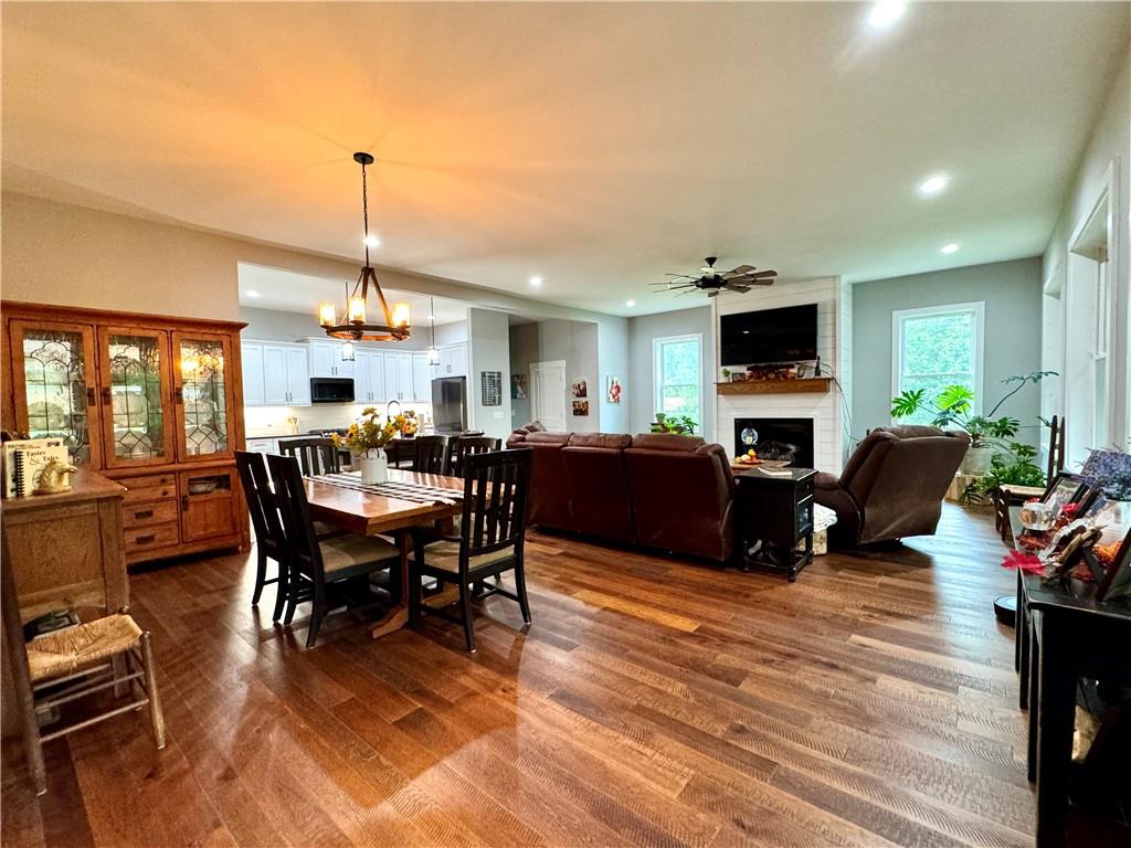 250 Hook Road Northeast Ranger, GA 30734 - Photo 39 of 114 a living room with furniture a flat screen tv and a table