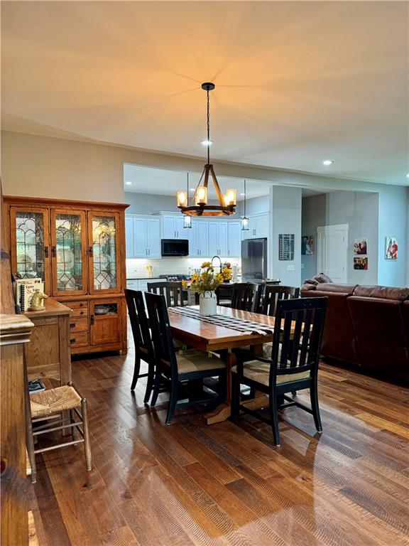 250 Hook Road Northeast Ranger, GA 30734 - Photo 40 of 114 a view of a dining room with furniture window and wooden floor