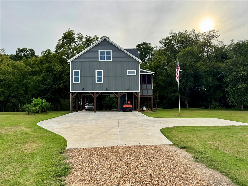 250 Hook Road Northeast Ranger, GA 30734 - Photo 4 of 114 a front view of a house with a yard