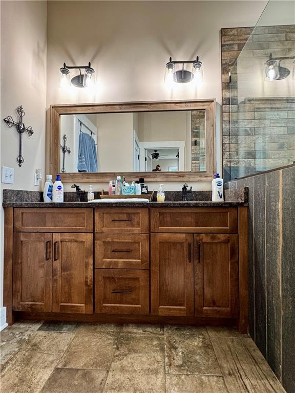 250 Hook Road Northeast Ranger, GA 30734 - Photo 52 of 114 a bathroom with a granite countertop sink and a mirror