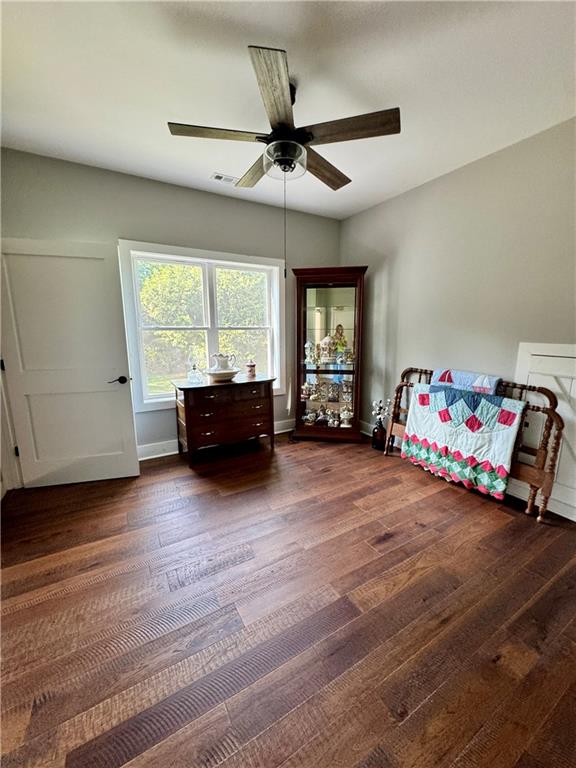 250 Hook Road Northeast Ranger, GA 30734 - Photo 57 of 114 a living room with a bed furniture and a window