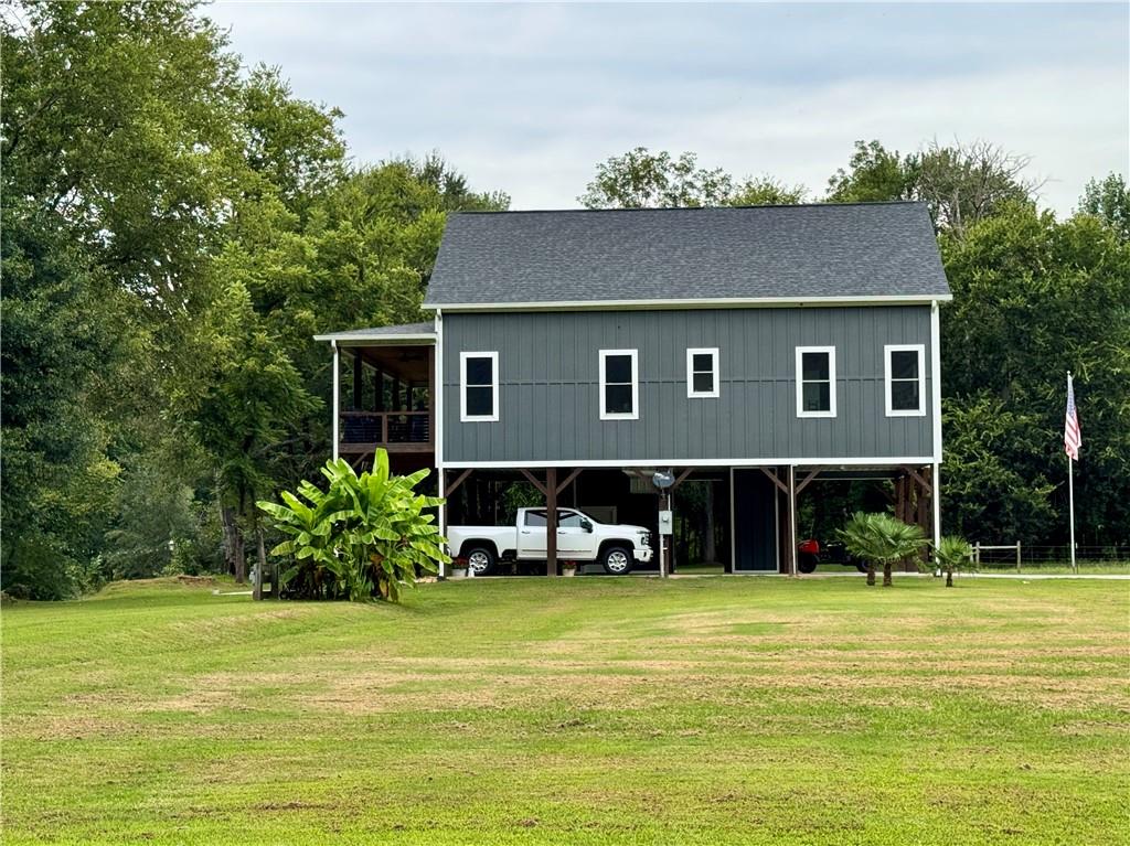 250 Hook Road Northeast Ranger, GA 30734 - Photo 8 of 114 a front view of house with yard and seating area
