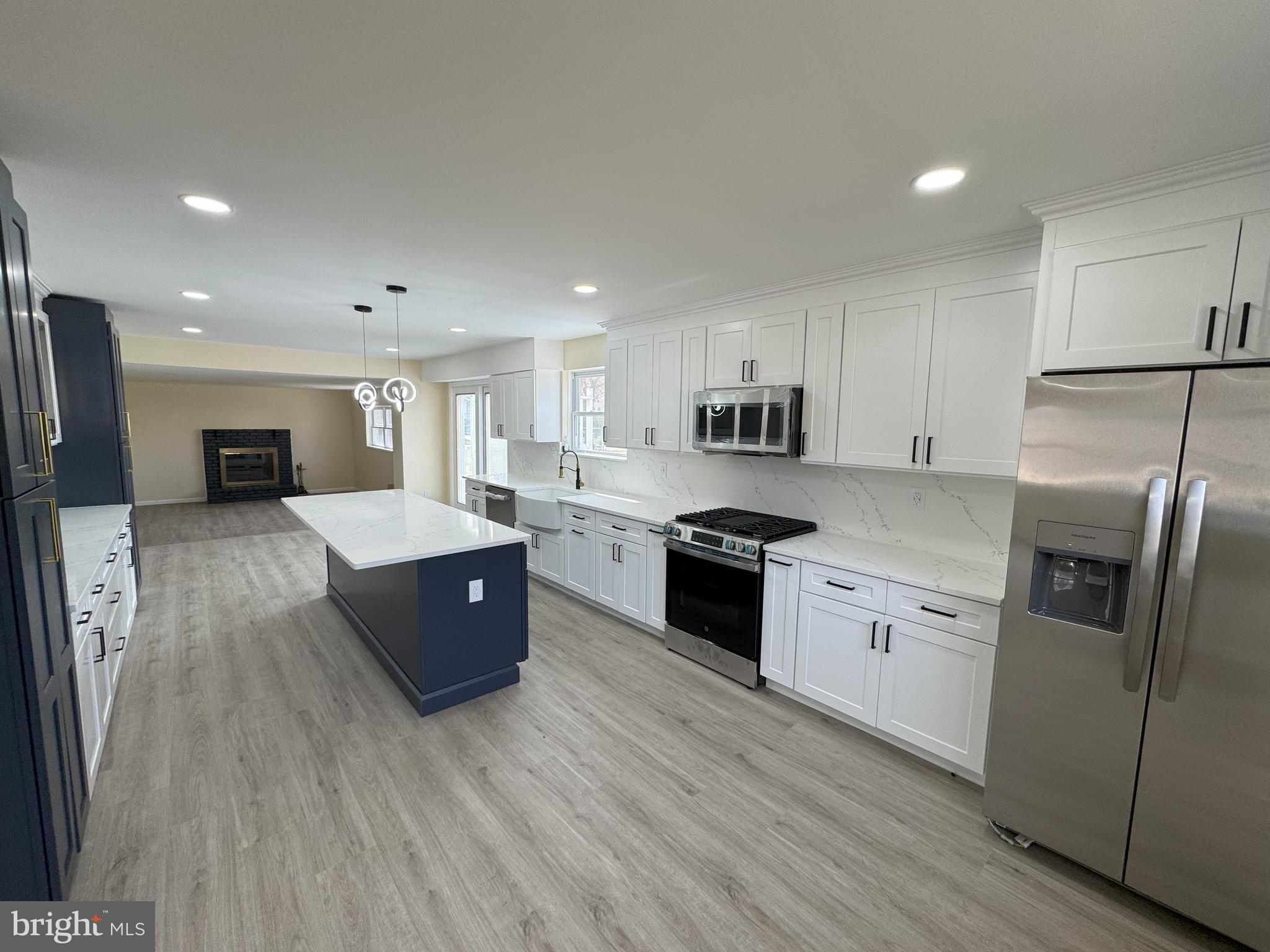 906 Marlowe Road Cherry Hill, NJ 08003 - Photo 12 of 38 a large kitchen with stainless steel appliances and a refrigerator