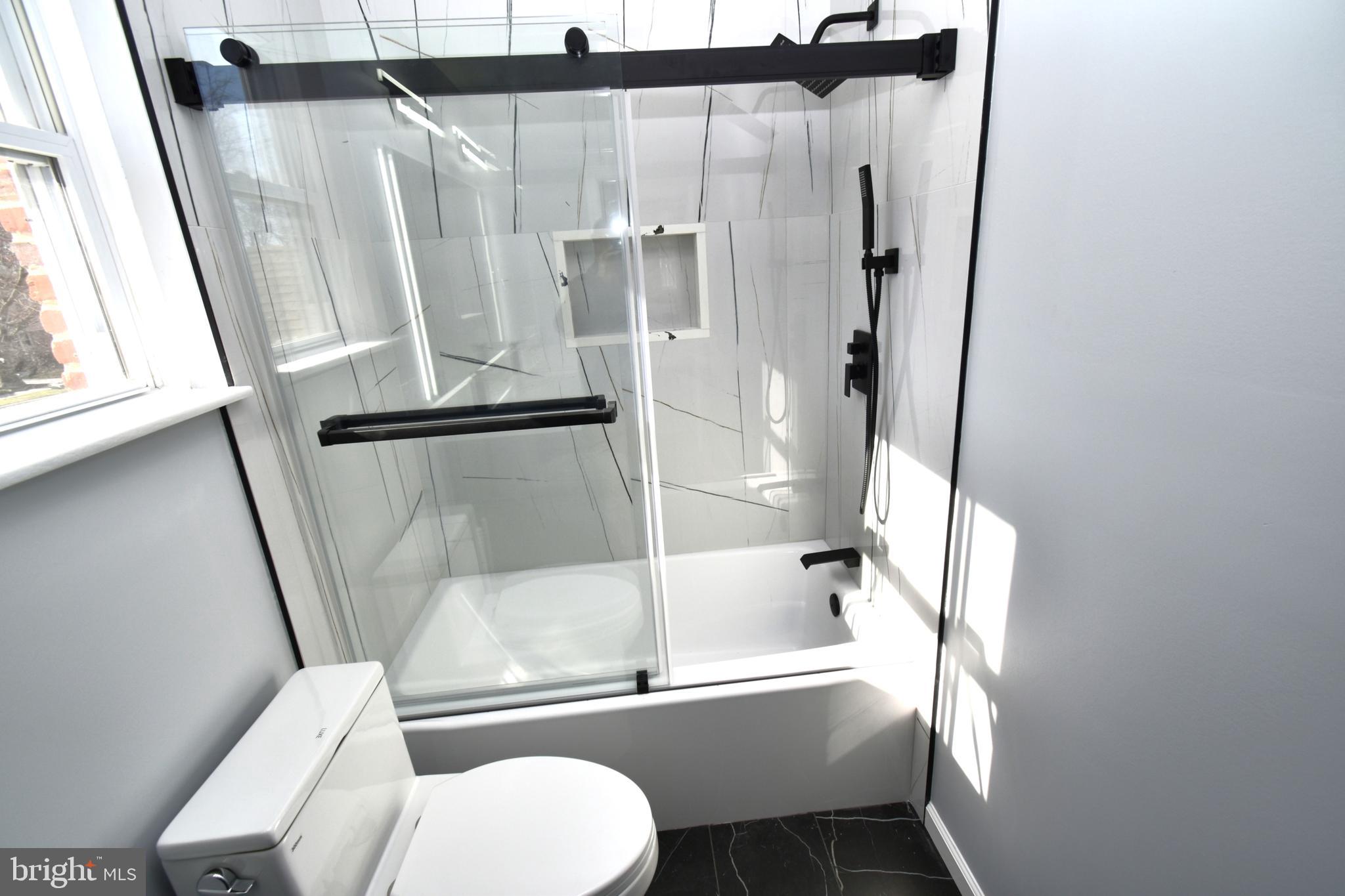 906 Marlowe Road Cherry Hill, NJ 08003 - Photo 20 of 38 a bathroom with a toilet and a bathtub