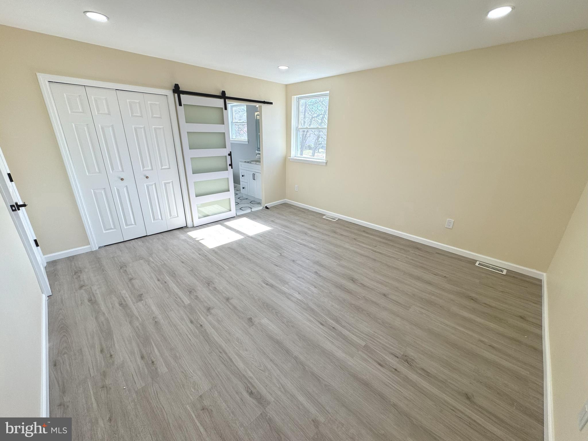 906 Marlowe Road Cherry Hill, NJ 08003 - Photo 22 of 38 wooden floor in an empty room with a window