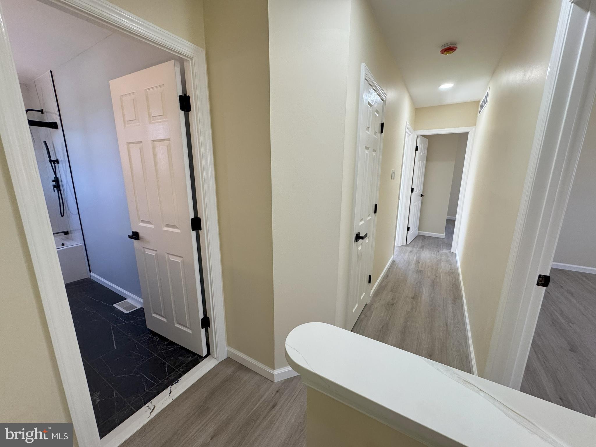 906 Marlowe Road Cherry Hill, NJ 08003 - Photo 28 of 38 a bathroom with a sink and glass door