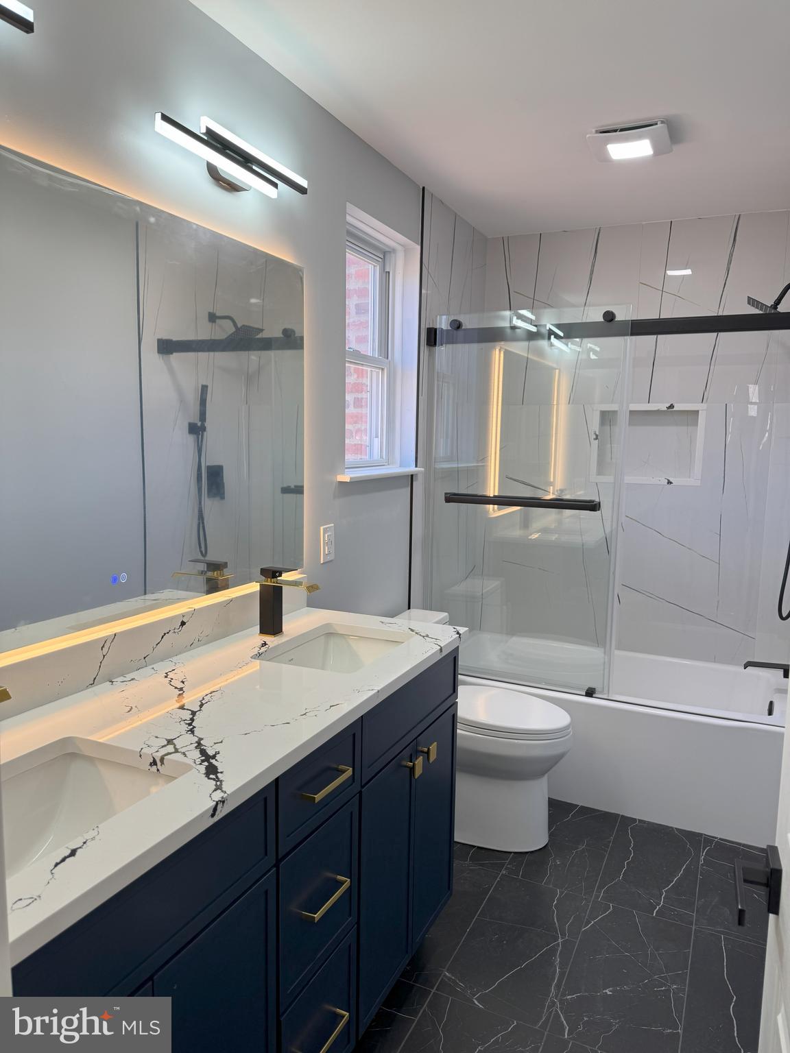 906 Marlowe Road Cherry Hill, NJ 08003 - Photo 32 of 38 a bathroom with a granite countertop sink toilet and shower