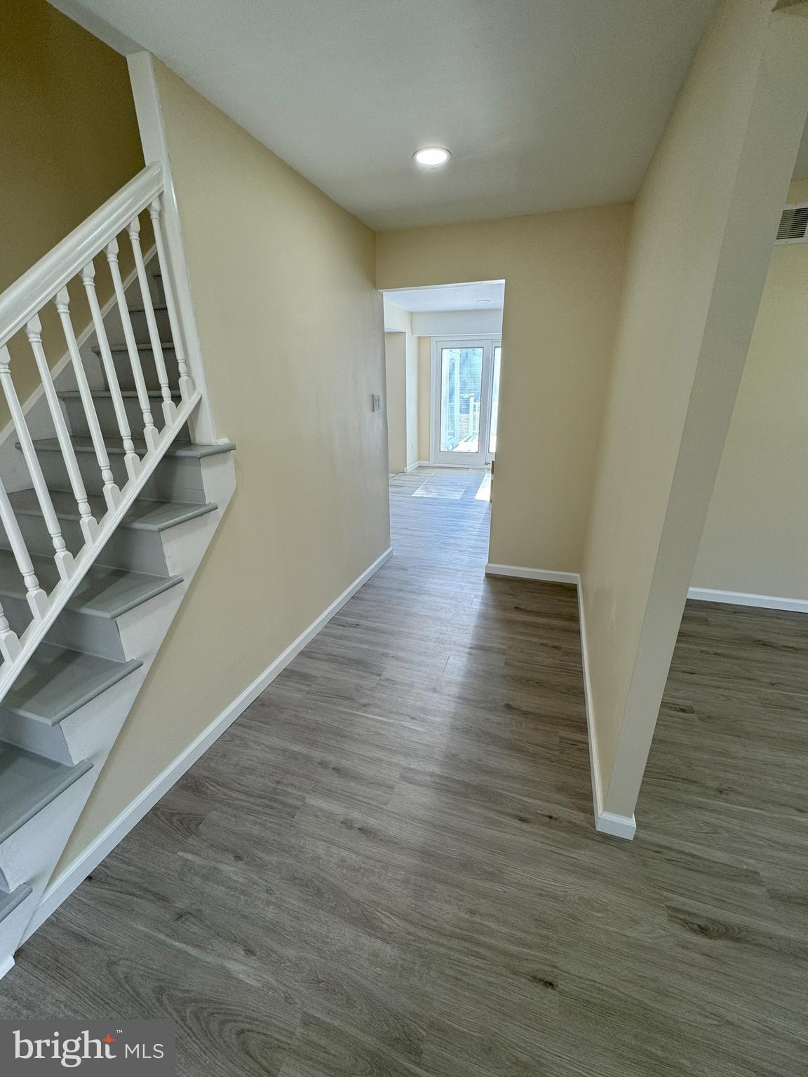 906 Marlowe Road Cherry Hill, NJ 08003 - Photo 5 of 38 a view of a hallway with wooden floor and staircase