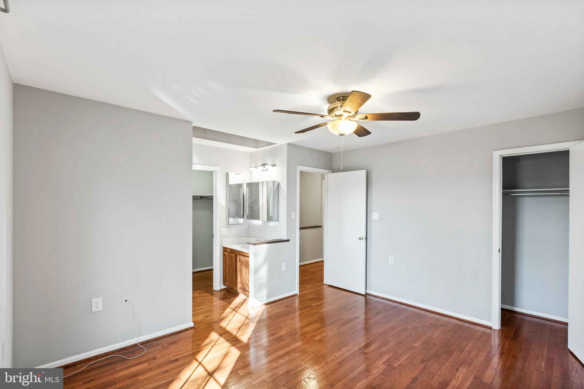 5416 Wycklow Court Alexandria, VA 22304 - Photo 17 of 46 a view of empty room with wooden floor