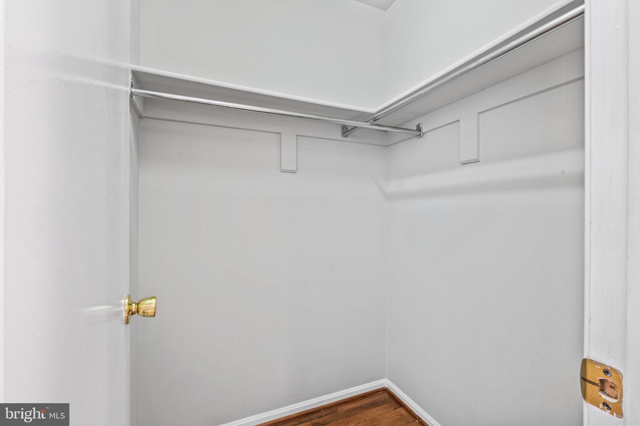 5416 Wycklow Court Alexandria, VA 22304 - Photo 20 of 46 a view of a room with racks on the wall