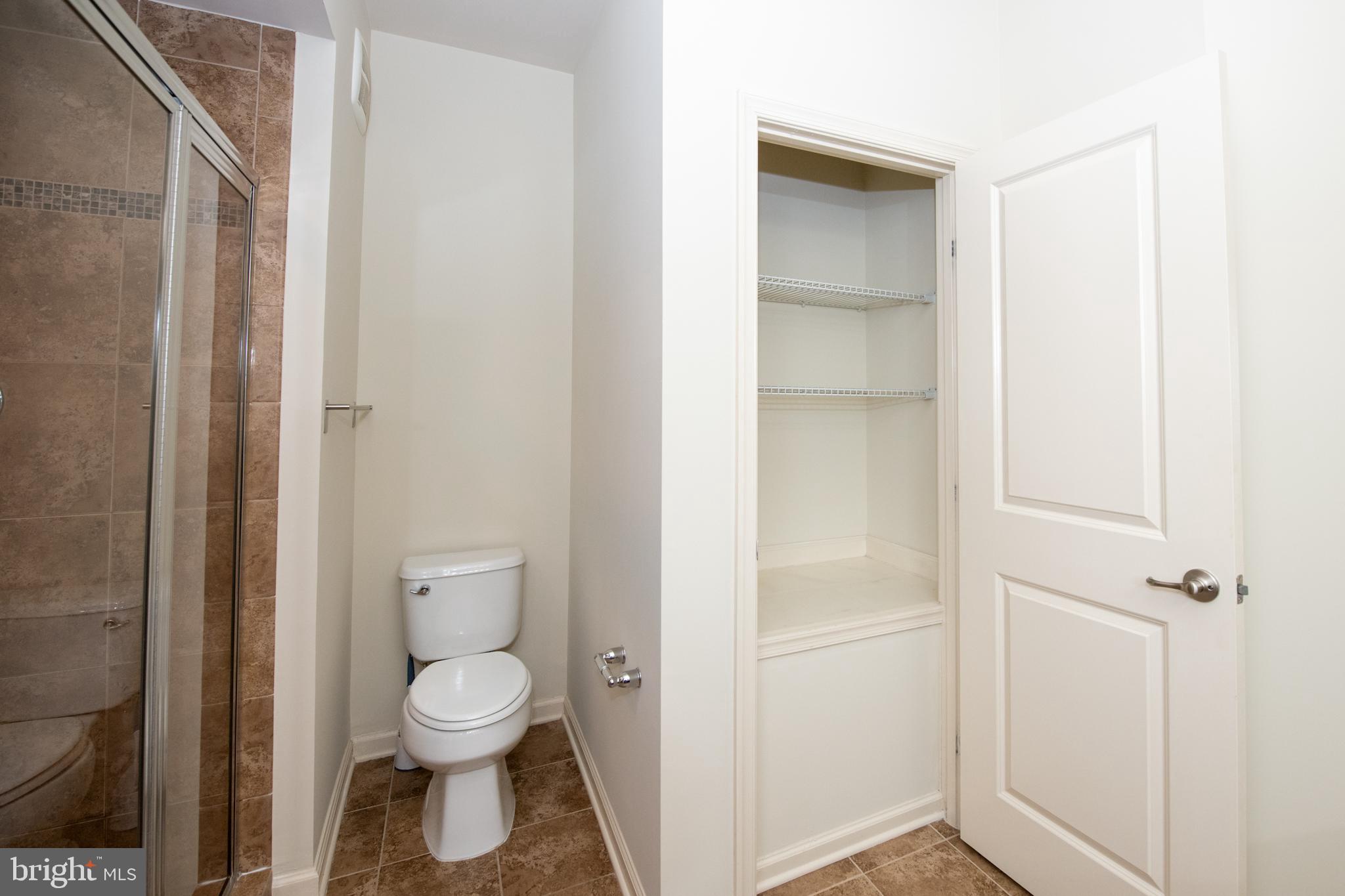 306 Mill Pond Road, Unit A Frederick, MD 21701 - Photo 27 of 31 Extra storage in bathroom!