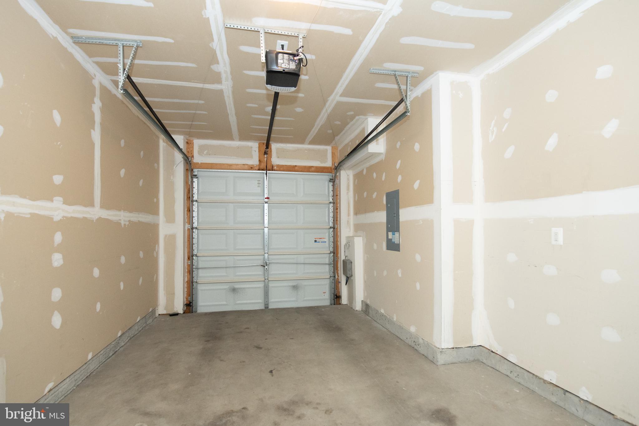 306 Mill Pond Road, Unit A Frederick, MD 21701 - Photo 30 of 31 Attached 1-car garage space w/additional parking