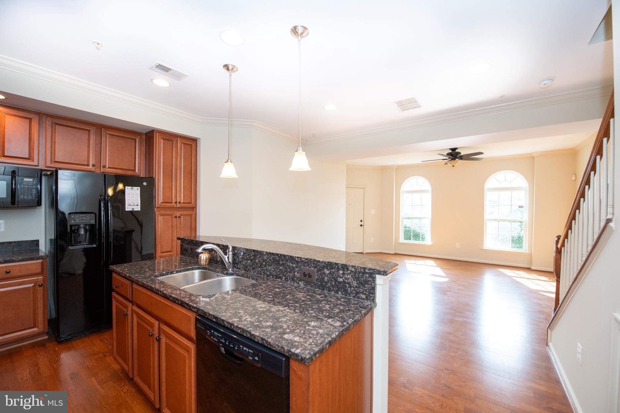 306 Mill Pond Road, Unit A Frederick, MD 21701 - Photo 8 of 31 Kitchen overlooking living room