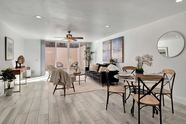 a kitchen with counter top space a sink and cabinets