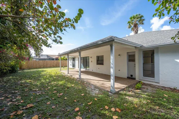 a view of backyard with green space