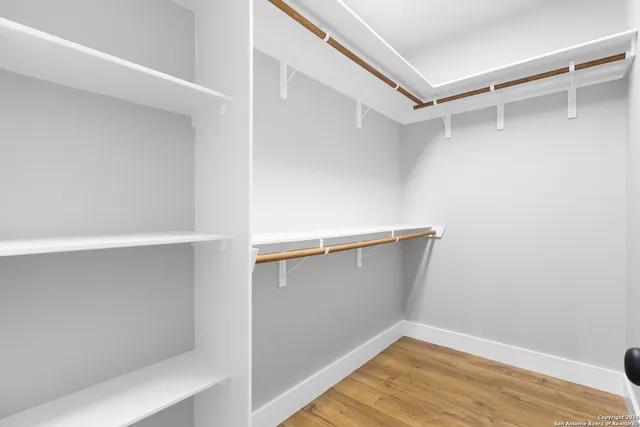 a view of an empty walk in closet