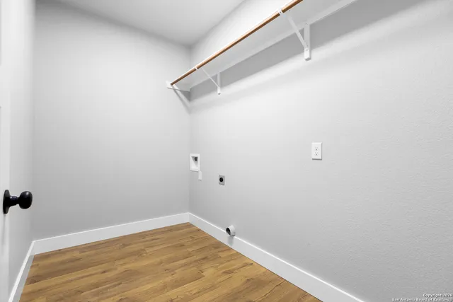 a view of a room with racks on the wall