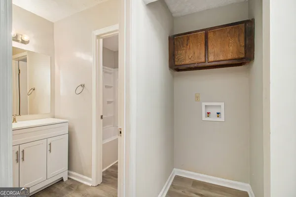 a view of an entryway with a microwave