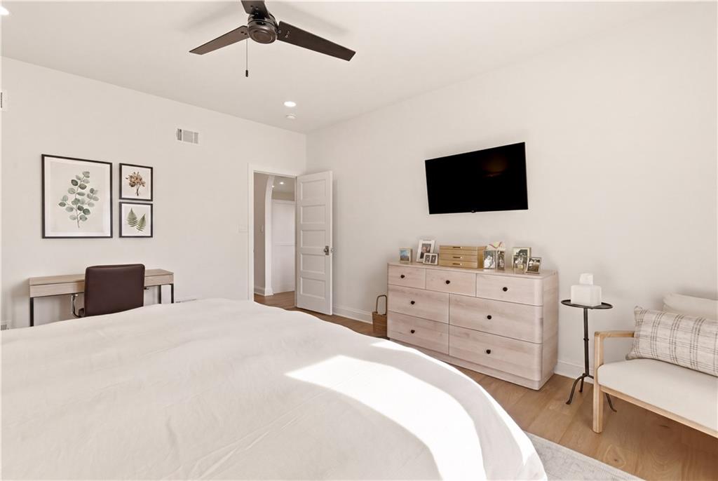 315 Stewarton Road Mill Run, PA 15464 - Photo 23 of 47 a bedroom with a bed and a flat screen tv