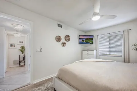 a view of empty room with windows