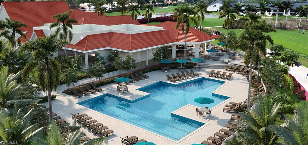 7300 St Ives Way, Unit 5208 Naples, FL 34104 - Photo 29 of 37 an aerial view of a house with swimming pool and outdoor seating