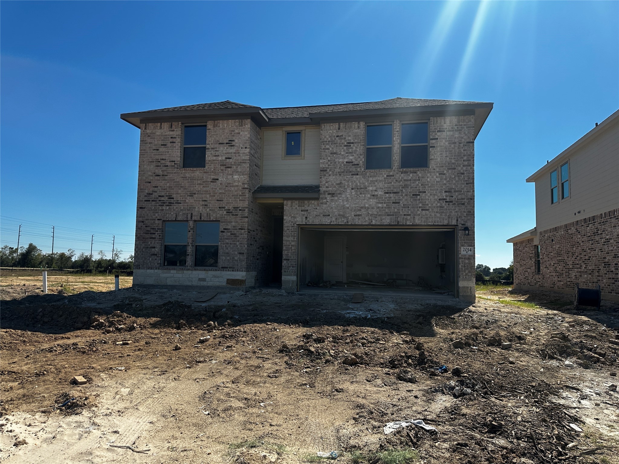 2014 Starlight Street Angleton, TX 77515 - Photo 9 of 16 a front view of a house with a yard