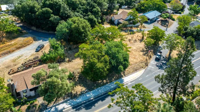 an aerial view of residential house with outdoor space