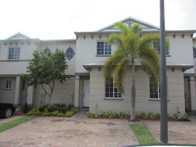 1107 Lucaya Drive Riviera Beach, FL 33404 - Photo 1 of 11 Front