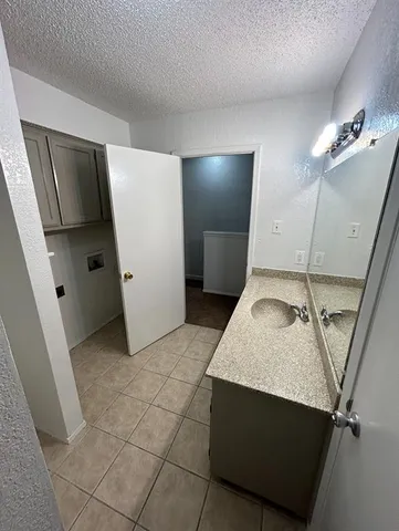 a view of a livingroom with furniture and a staircase