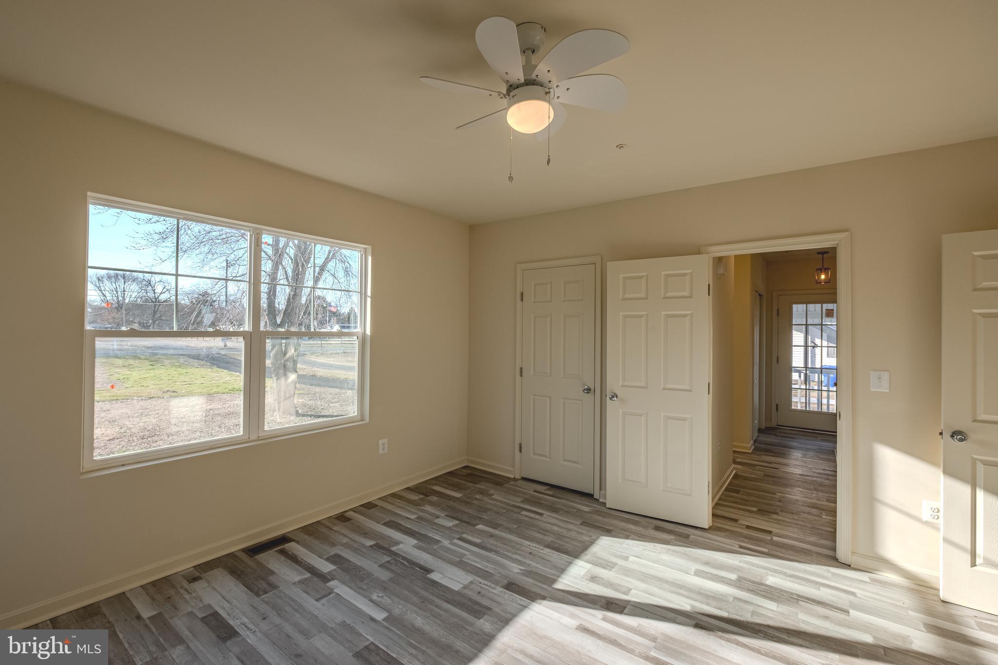 7391 Benedict Avenue Benedict, MD 20612 - Photo 21 of 38 a view of an empty room with a window