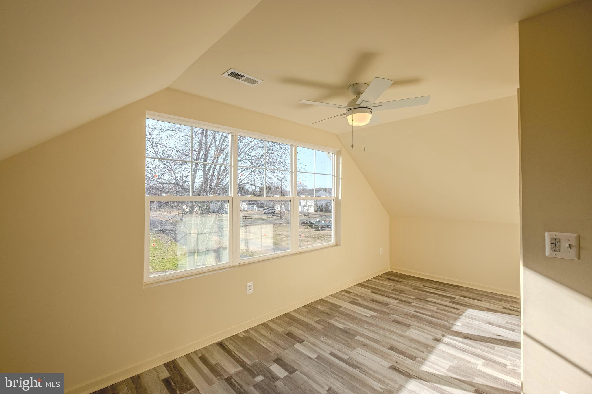 7391 Benedict Avenue Benedict, MD 20612 - Photo 34 of 38 a view of an empty room and window